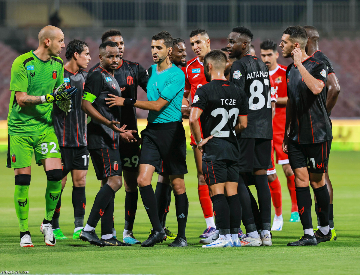 تعادل مثير تحت الأمطار